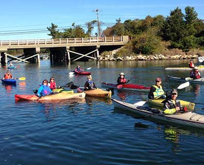 Canoe and Kayak racers getting in place for start